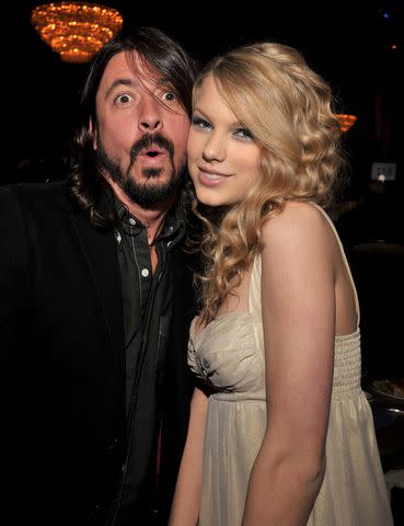 <p>Lester Cohen/WireImage</p> Dave Grohl and Taylor Swift in 2008