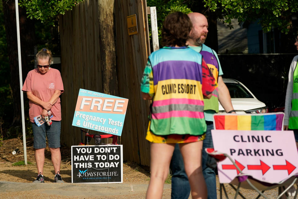 Activists gather in front of Jackson Women’s Health Organization, the abortion clinic in Jackson, Miss., at the center of the Supreme Court case<span class="copyright">Rogelio V. Solis—AP</span>