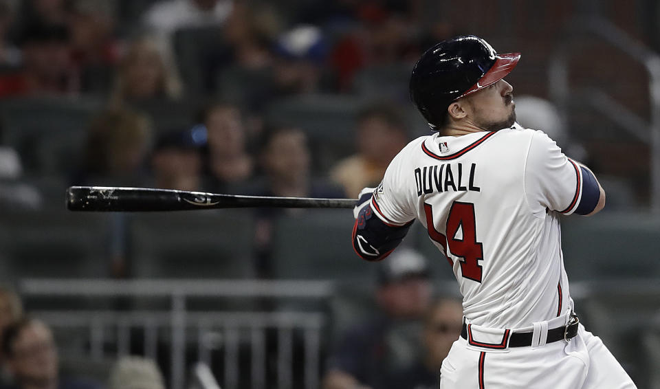 Atlanta Braves' Adam Duvall watches his home run against the Washington National during the eighth inning of a baseball game Thursday, Sept. 9, 2021, in Atlanta. (AP Photo/Ben Margot)