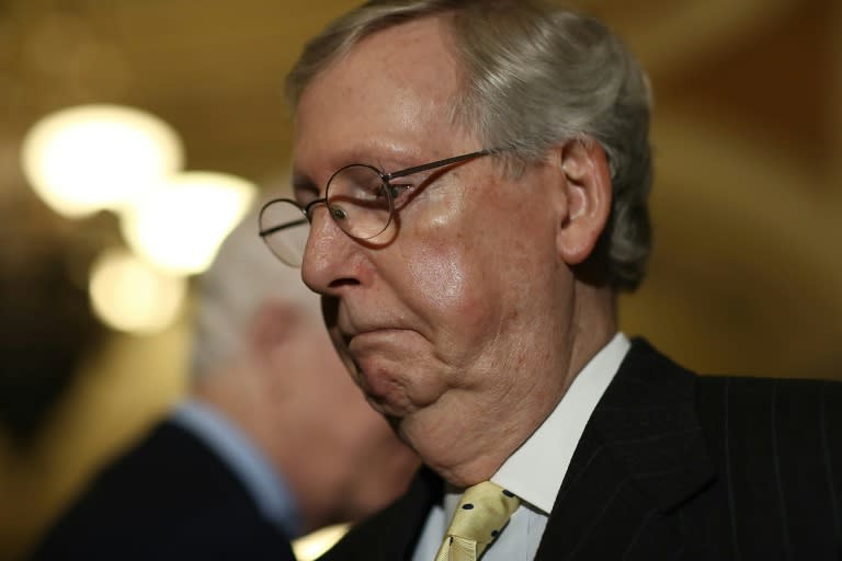 Senate Majority Leader Mitch McConnell (R-KY) takes questions from reporters following the Republican caucus policy luncheon, at the US Capitol in Washington, DC, on April 25, 2017