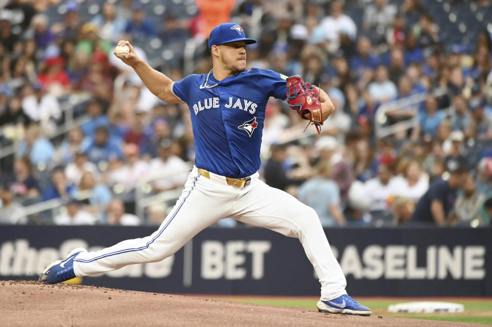 Toronto Blue Jays pitcher Jose Berrios (17) works against the Houston Astros during the first inning of a baseball game, Tuesday, July 2, 2024, in Toronto. (Jon Blacker/The Canadian Press via AP)