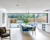 <p> The trend towards open-plan living has soared in recent years. Whilst the kitchen has always been dubbed the heart of the home, this space is no longer just for cooking. Within a modern set-up, an open plan kitchen can also be used as a dining area, work space and somewhere to gather as a family or socialise with friends.   </p> <p> ‘The area immediately outside the kitchen is increasingly becoming kitchen territory, ideally with a terrace for alfresco dining,’ says designer Johnny Grey.  </p> <p> ‘The easiest way to make good use of outdoor space year round is to have one wall of the kitchen completely glass or with large doors that fold or slide back,’ advises Steven de Munnich, design director of Smallbone of Devizes. ‘Glass structures allow light to flood into the room and help make the garden feel like part of the kitchen-living space,’ he adds. </p>