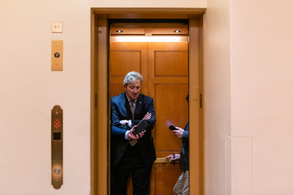 Louisiana Sen. John Kennedy stands inside an elevator.