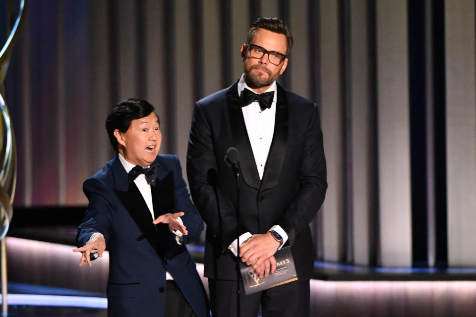 Actors Joel McHale and Ken Jeong speak onstage during the 75th Emmy Awards at the Peacock Theatre at L.A. Live in Los Angeles on January 15, 2024. (Photo by Valerie Macon / AFP) (Photo by VALERIE MACON/AFP via Getty Images)