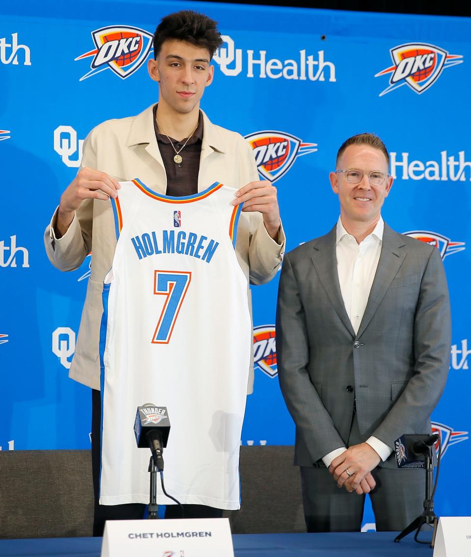 Thunder draft pick Chet Holmgren and general manager Sam Presti pose for a photo during a press conference in Oklahoma City on June 25, 2022.