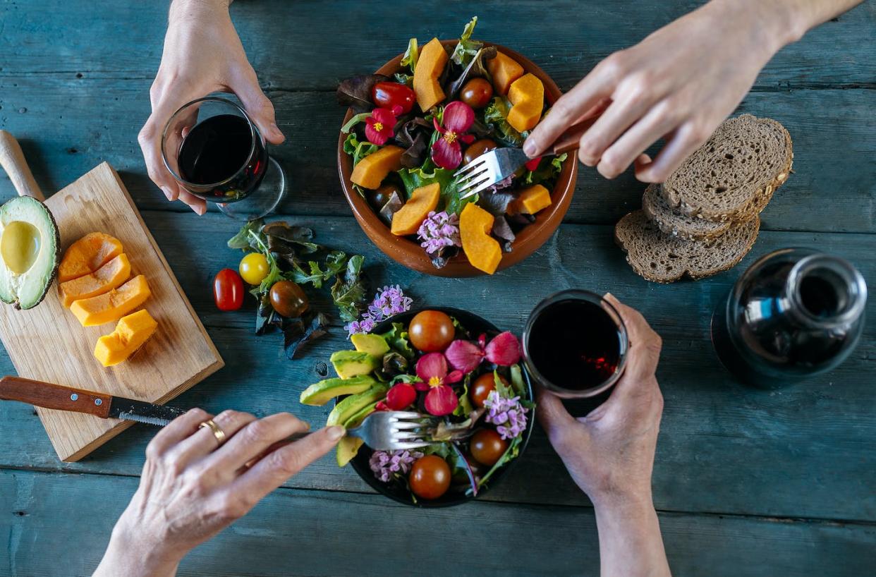 The new rating system shows that eating the right amount of vegetables can lower your risk of heart disease by nearly 20%. <a href="https://www.gettyimages.com/detail/photo/eating-mixed-salads-and-drinking-red-wine-royalty-free-image/726799295?phrase=eating%20vegetables&adppopup=true" rel="nofollow noopener" target="_blank" data-ylk="slk:Westend61/Getty Images;elm:context_link;itc:0;sec:content-canvas" class="link ">Westend61/Getty Images</a>