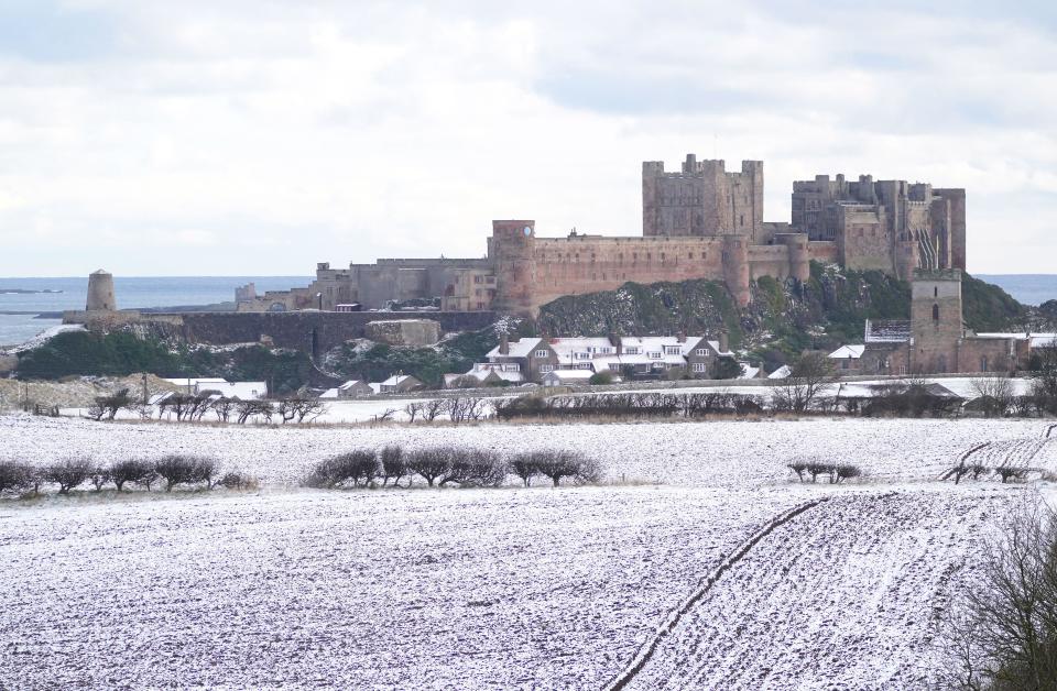 General view of Bamburgh Castle surrounded by snow in Bamburgh, Northumberland. Picture date: Thursday March 9, 2023.