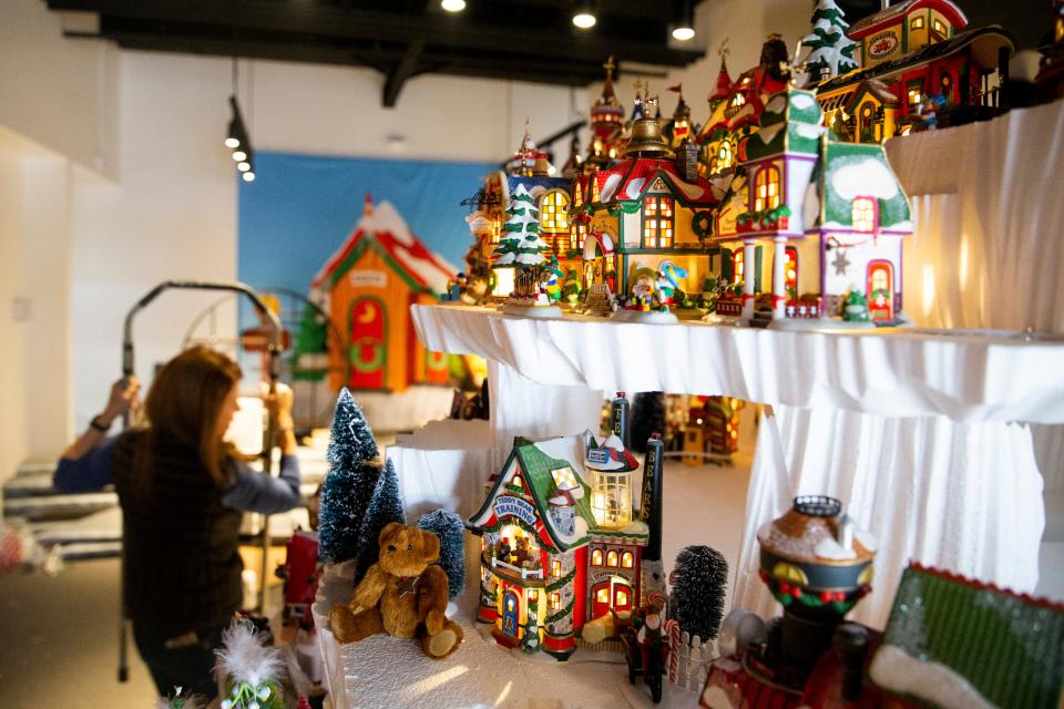 North Pole-themed village pieces are seen as the Enesco Giftshop and Gallery Featuring Department 56 exhibit is put together before its opening Thursday at Graceland Crossing in Memphis, Tenn., on Wednesday, November 15, 2023.