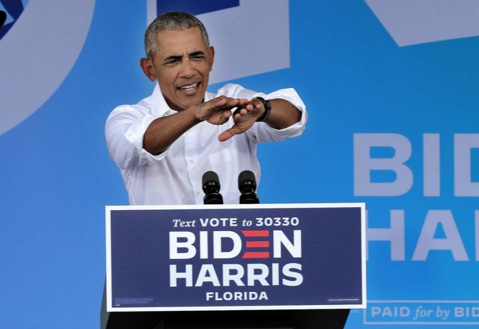 Former President Barack Obama speaks during a drive-in car rally in North Miami as he campaigns for Joe Biden in South Florida on Saturday, October 24, 2020