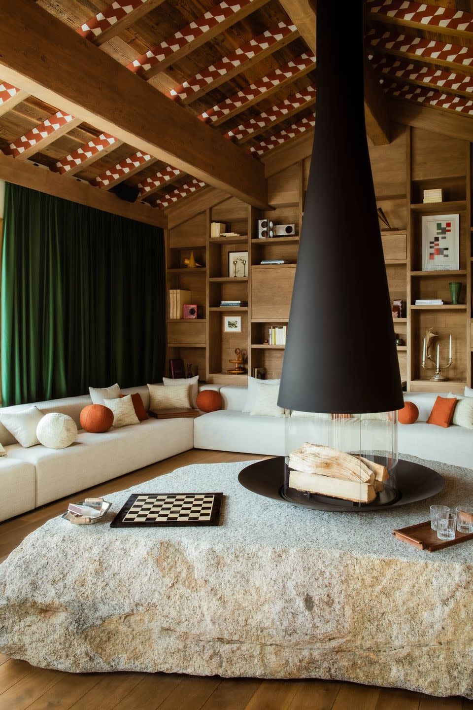 a living room with a large chimney