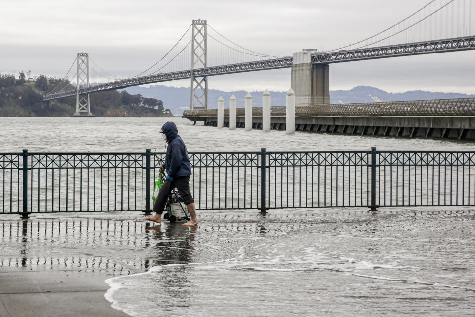 A king tide washes up along the Embarcadero in San Francisco on Jan. 3, 2022. 
