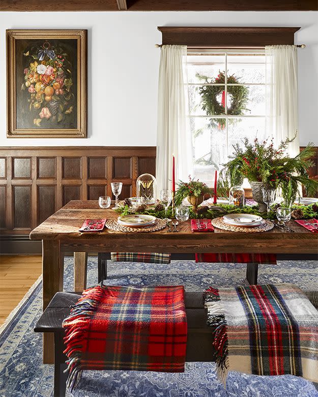 <p>Make guests feel cozy with this easy setup—no holiday china required! Just layer on the plaid napkins and blankets as seat cushions for a little holiday pizzazz. Add red or green tapers and snip greens from outside to bring this look together.</p><p><a class="link " href="https://www.amazon.com/JUDYBRIDAL-Chenille-All-Season-Dual-Sided-Multi-Colored%EF%BC%88Red%EF%BC%89/dp/B07WSWHQML/ref=sr_1_6?tag=syn-yahoo-20&ascsubtag=%5Bartid%7C10050.g.644%5Bsrc%7Cyahoo-us" rel="nofollow noopener" target="_blank" data-ylk="slk:Shop Now;elm:context_link;itc:0;sec:content-canvas">Shop Now</a></p>