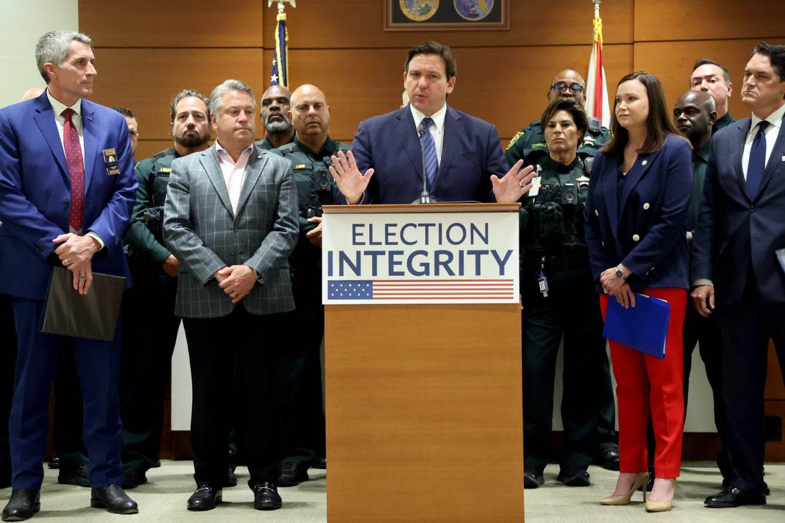 Gov. Ron DeSantis announces the arrests of former felons on voting fraud charges in August.