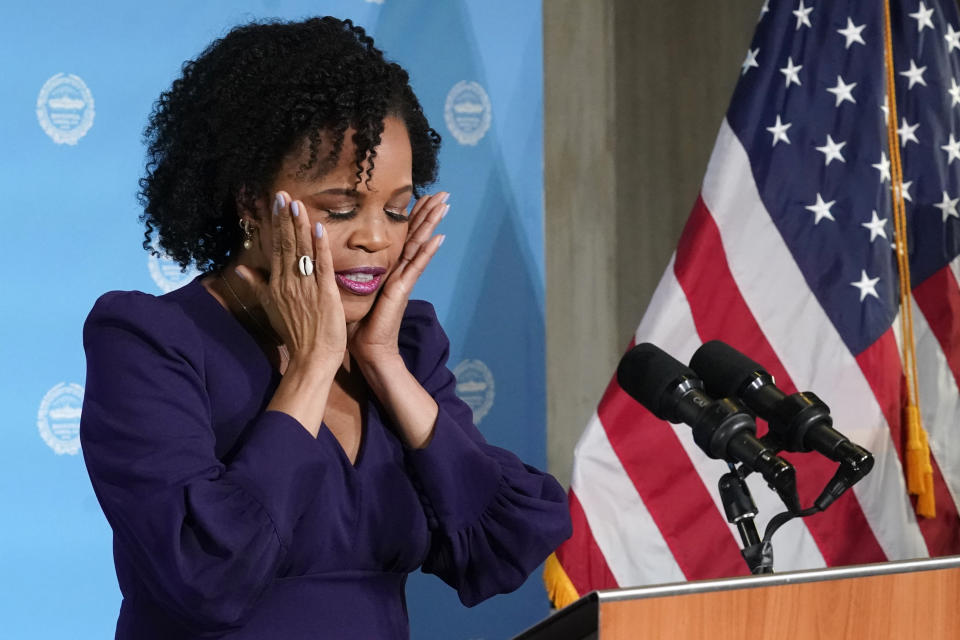 Former Boston City Council President Kim Janey, 55, composes herself as she begins to speak after being sworn in as Boston's new mayor at City Hall, Wednesday, March 24, 2021, in Boston. Janey, who is the city's first female and first person of color to take the office, replaces Marty Walsh who resigned Monday evening to become President Joe Biden's labor secretary. (AP Photo/Elise Amendola)