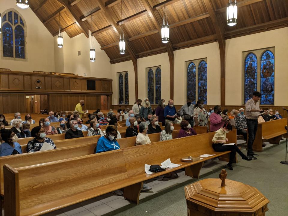 Members of JUST Savannah attend a rally at First Presbyterian Church in April 2022 to prepare for their annual day of action, where the coalition of 18 churches will advocate for affordable housing and an end to cash bail in Chatham County.