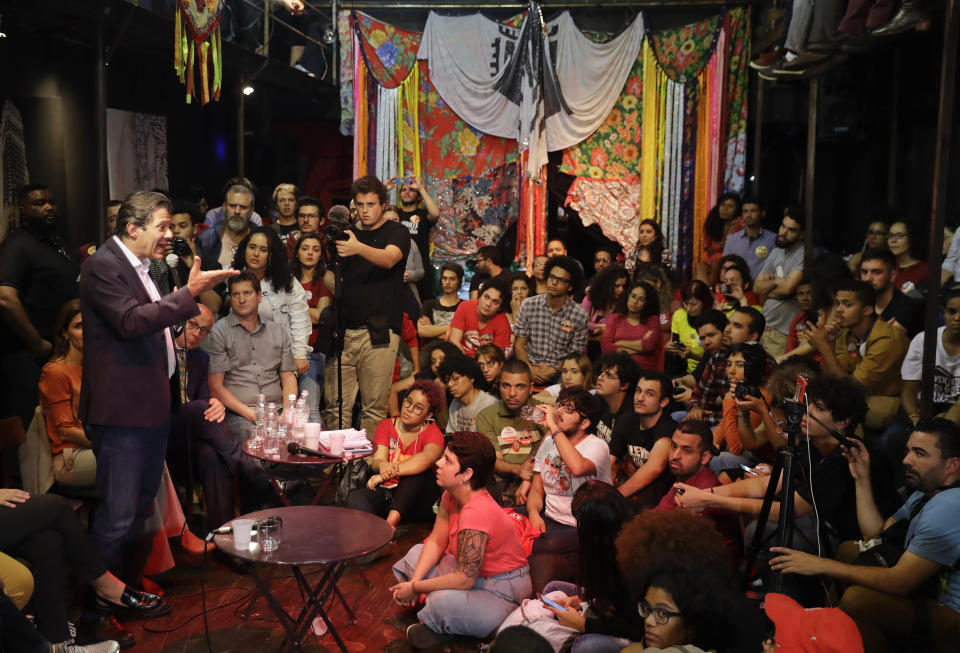 Brazil's presidential candidate for the Workers Party Fernando Haddad speaks during a meeting with students, in Sao Paulo, Brazil, Wednesday, Sept. 12, 2018. Haddad met with university students who benefited from an affirmative action program for underprivileged youth and racial minorities, put in place during the presidency of Luiz Inacio Lula da Silva. Brazil will hold general elections on Oct. 7. (AP Photo/Andre Penner)