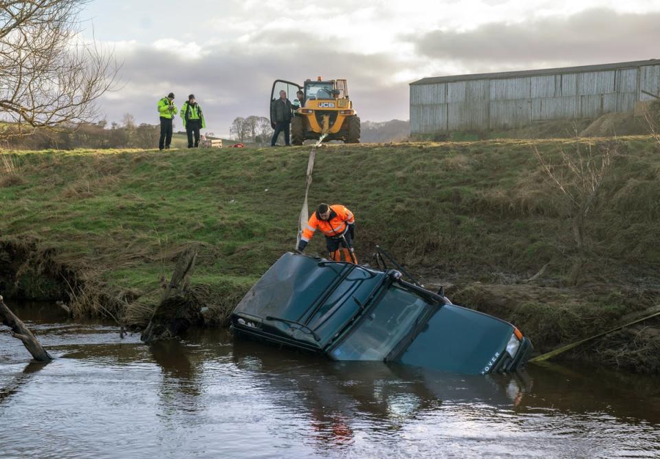 The vehicle being recovered from the River Esk (PA)