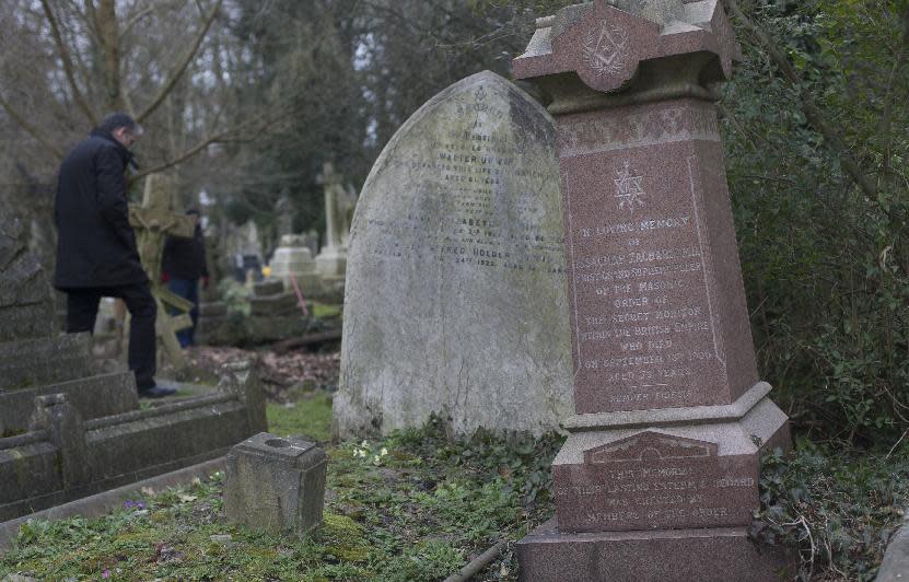 The grave of Dr Isachar Zacharie which stands lopsided amongst other decaying tombs in Highgate Cemetery in north London Thursday, Feb. 28, 2013. Zacharie,, best known as Abraham Lincoln’s foot doctor, treating him and many members of the United States army during the US Civil War, died in London in 1900 and is buried in the same cemetery that also contains the remains of the philosopher Karl Marx . (AP Photo/Alastair Grant)