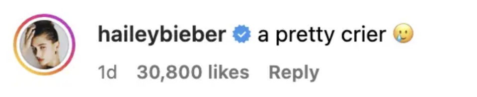Instagram comment by user haileybieber with the text "a pretty crier" followed by a side-looking face emoji, indicating humor