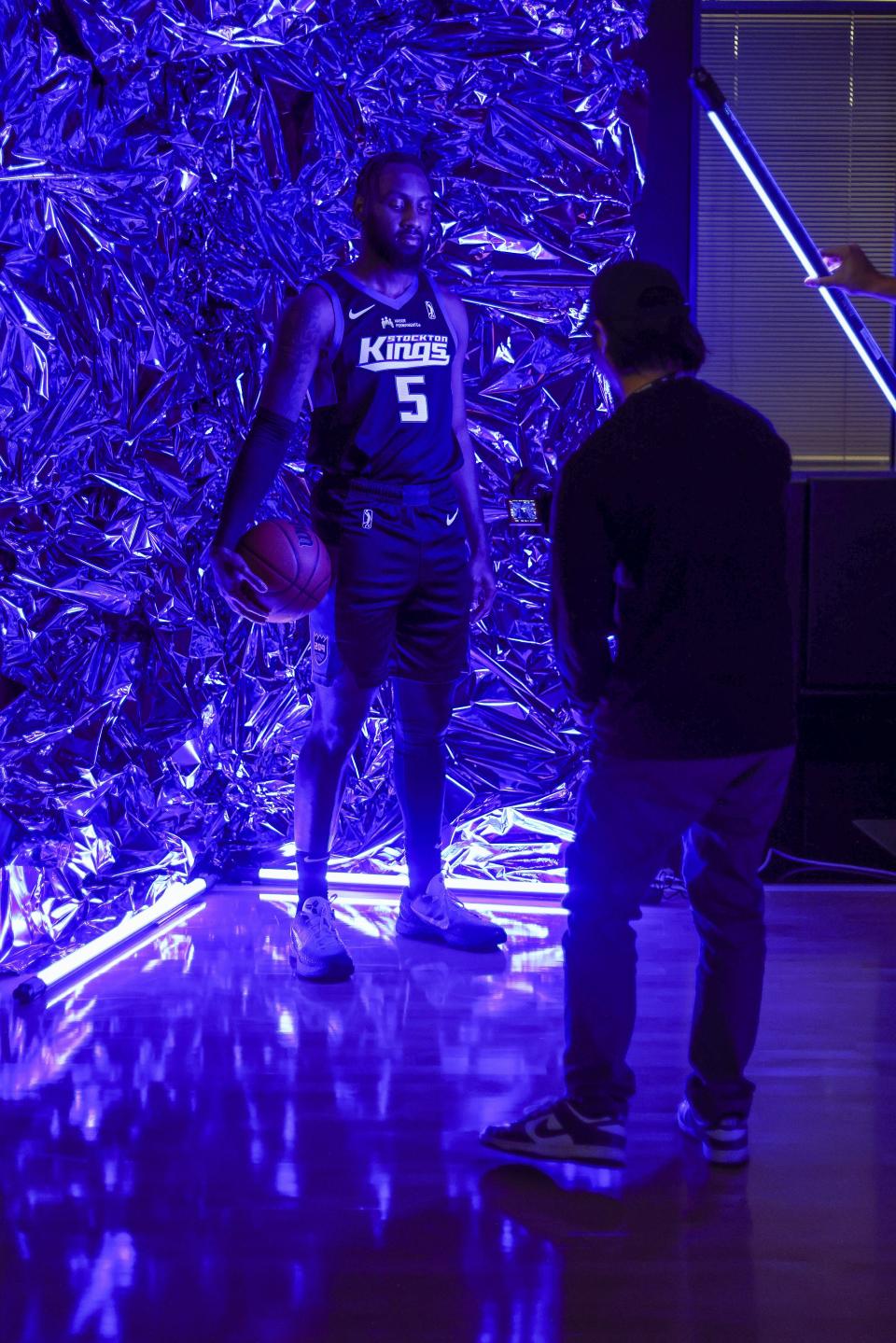 Stockton Kings media team members work on graphics for the upcoming season with G/F Jaylen Nowell during the Stockton Kings annual Media day at their practice facility in Sacramento, CA