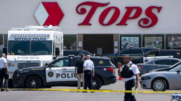 PHOTO: In this May 15, 2022, file photo, law enforcement officials respond to the scene of a mass shooting at Tops Friendly Market at Jefferson Avenue and Riley Street in Buffalo, N.Y. (Kent Nishimura/Los Angeles Times via Getty Images, FILE)