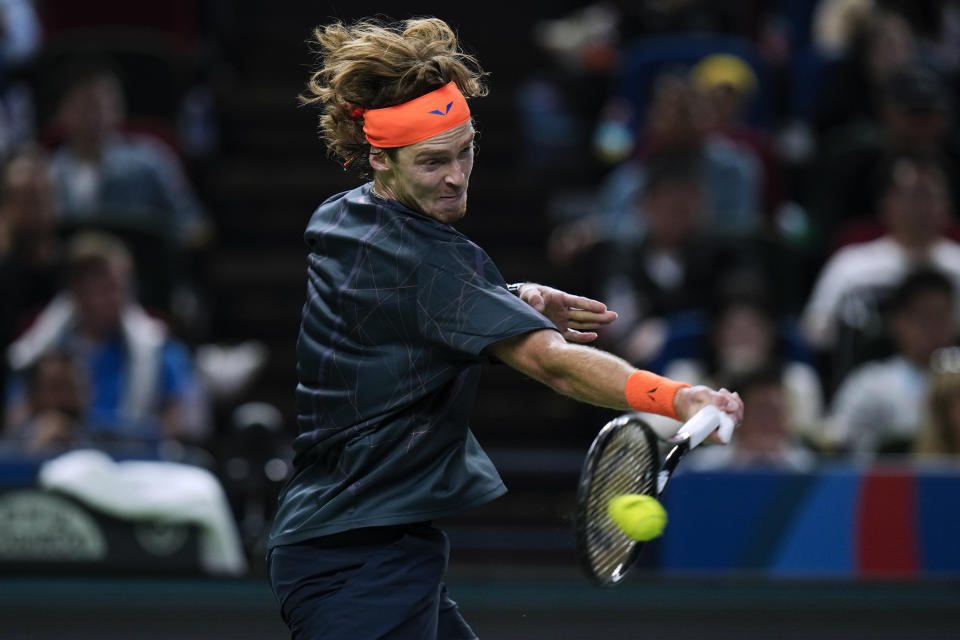 Andrey Rublev of Russia returns a shot to Hubert Hurkacz of Poland during the men's singles final match in the Shanghai Masters tennis tournament at Qizhong Forest Sports City Tennis Center in Shanghai, China, Sunday, Oct. 15, 2023. (AP Photo/Andy Wong)