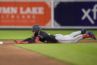 Minnesota Twins' Ryan Jeffers slides into second base after hitting a double against the Baltimore Orioles during the sixth inning of a baseball game Tuesday, April 16, 2024, in Baltimore. (AP Photo/Jess Rapfogel)