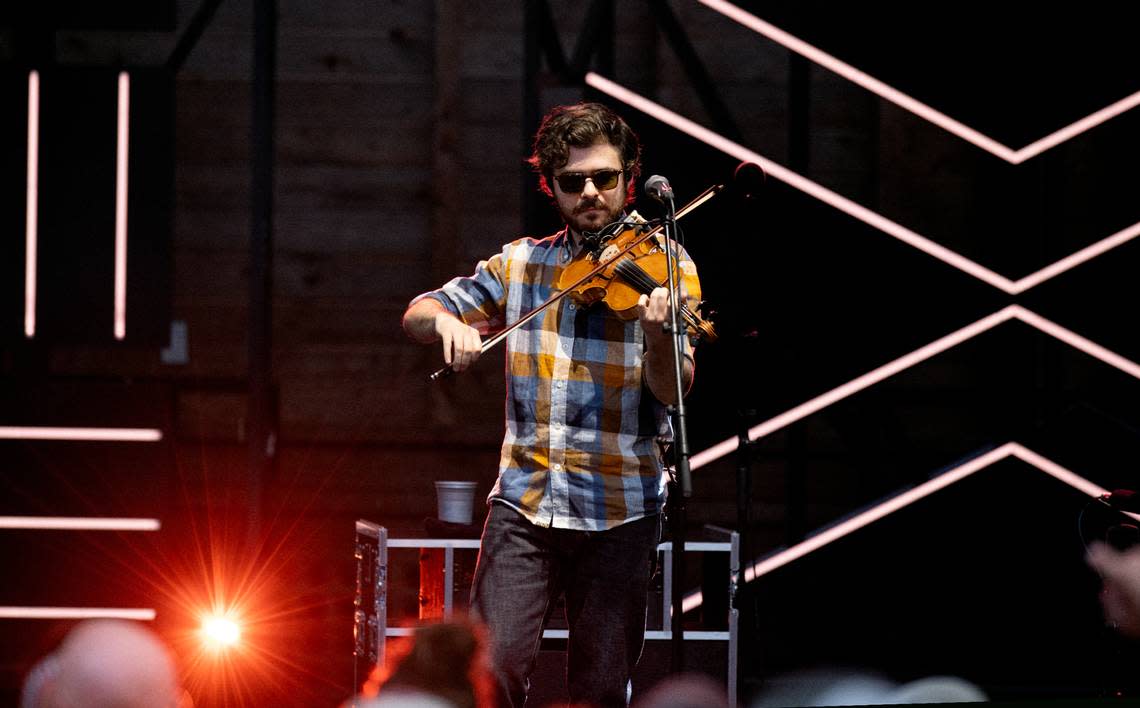 Alex Hargreaves on fiddle with Billy Strings in Cary.