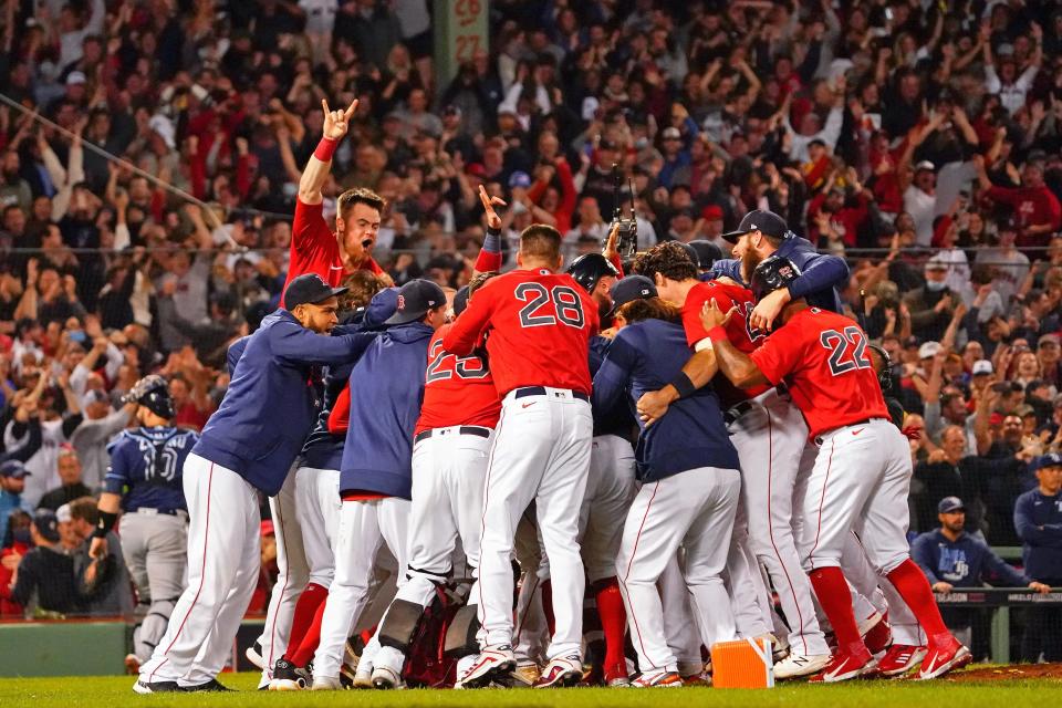 Red Sox players celebrate their win in Game 4 of the NLDS.