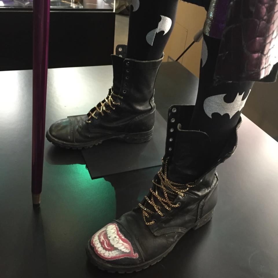 <p>His boots have gold-chain laces and his smile logo, while his stockings pay tribute to a certain archnemesis.</p>