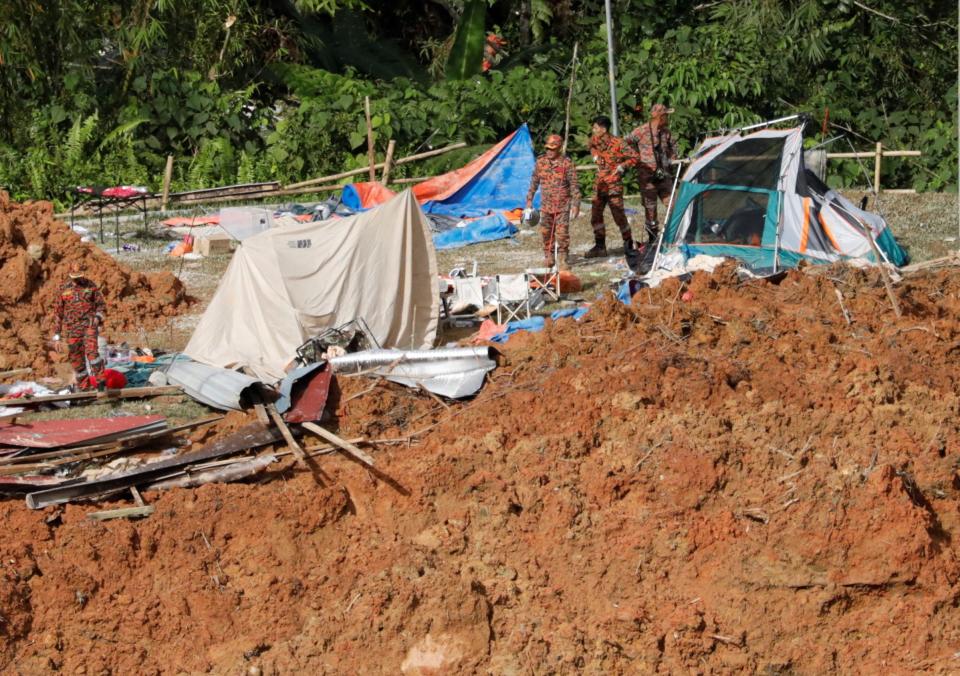 馬來西亞一處露營區發生山崩意外，造成24人罹難。（路透社）