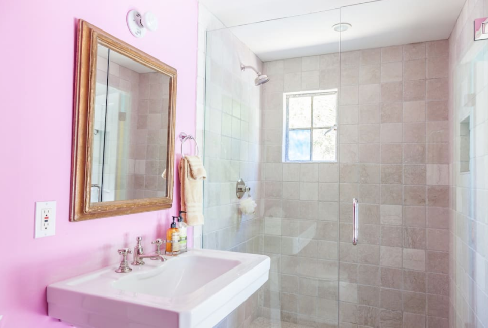 <p>This bathroom boasts a glass-door shower. (Airbnb) </p>