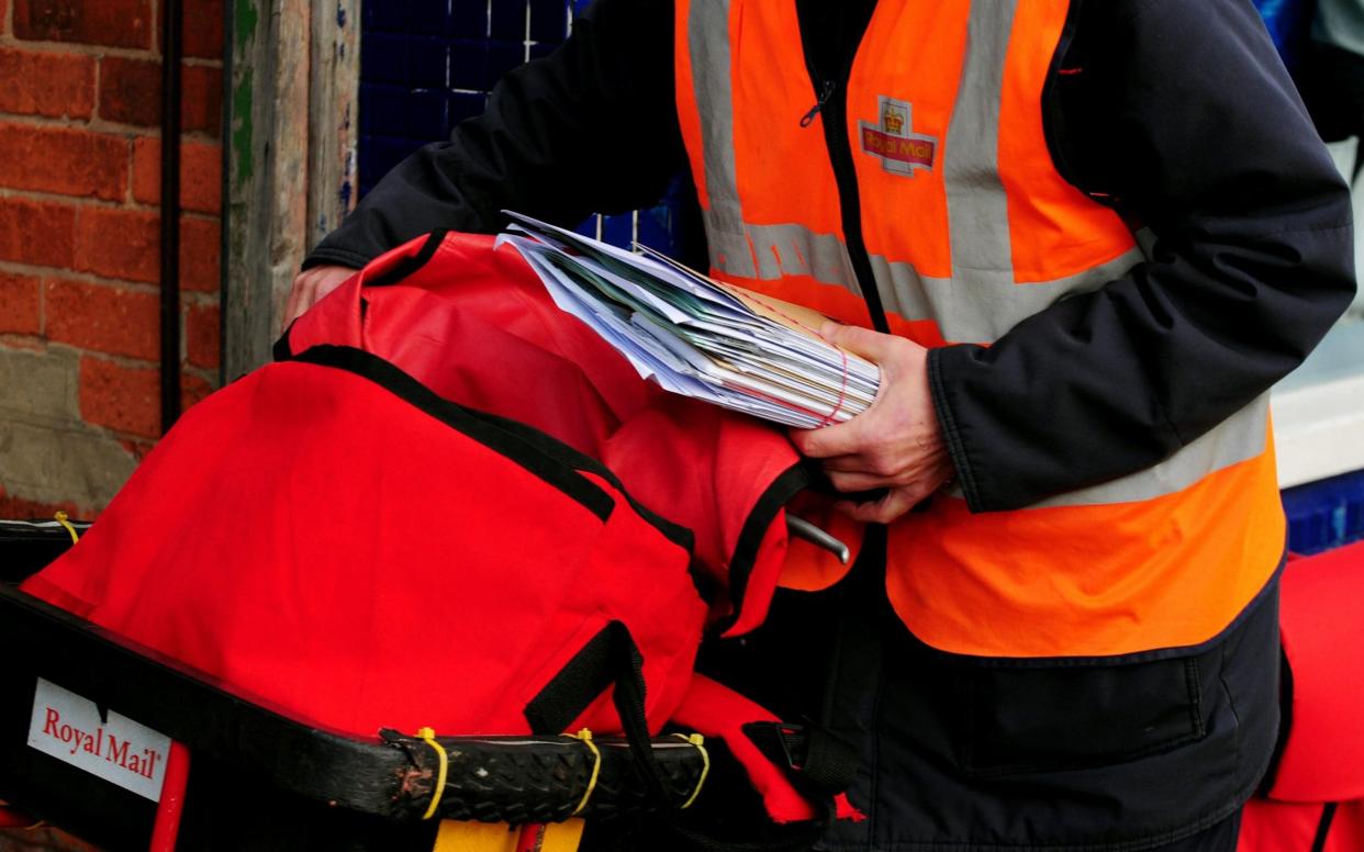 Royal Mail employees bitten by dogs have been left with permanent and disabling injuries - PA