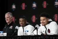 San Diego State guard Matt Bradley speaks during a news conference as guard Lamont Butler and head coach Brian Dutcher on look at the Final Four NCAA college basketball tournament on Sunday, April 2, 2023, in Houston. San Diego State and Connecticut play for the national championship on Monday. (AP Photo/David J. Phillip)