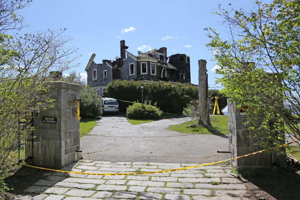 Firefighters battled a blaze Friday afternoon May 13, 2022, that nearly destroyed a historic beachfront home on Freeman Street in York, Maine.