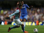 Aston Villa's Matthew Lowton (left) and Chelsea's Ashley Cole (right) battle for the ball