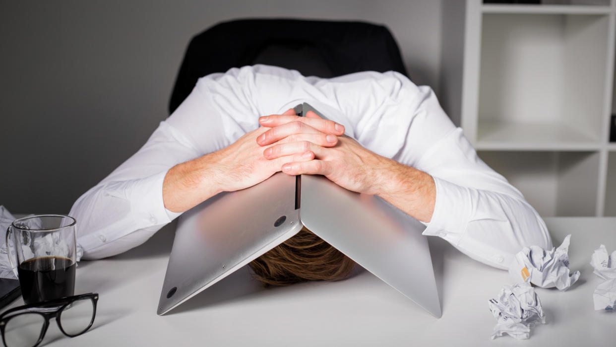  Frustrated man on laptop. 