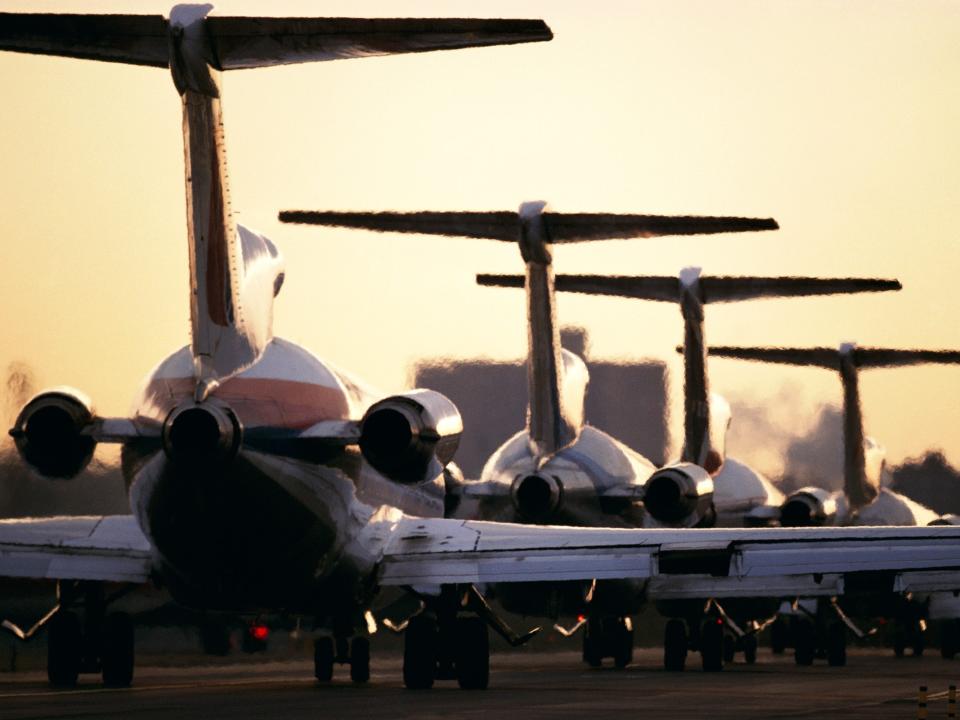 Airline Jets Lined up on Runway