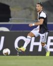 <p>Juventus player Cristiano Ronaldo kicks the ball during a match between Bologna FC and his team at Stadio Renato Dall'Ara in Bologna, Italy, on Monday.</p>