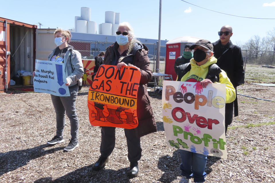 Environmental justice protestors demonstrate in Newark, N.J., on April 20, 2022, against a gas-fired backup power plant proposed for a sewage treatment plant in the area. On Jan. 26, 2024, NJ Transit scrapped plans for a similar gas-fired backup power plant in Nearby Kearny, renewing calls for the Newark project to be abandoned as well in a community that is already overburdened by pollution. (AP Photo/Wayne Parry)