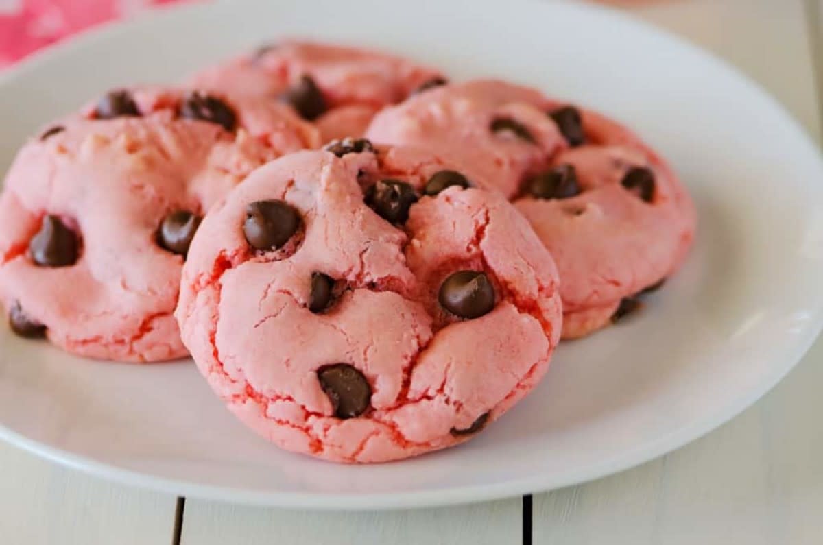 <p>The Country Cook</p><p>These pretty pastel pink strawberry cookies come together using boxed cake mix.</p><p><strong>Get the recipe: <a href="https://www.thecountrycook.net/strawberry-chocolate-chip-cookies/" rel="nofollow noopener" target="_blank" data-ylk="slk:Strawberry Chocolate Chip Cake Mix Cookies;elm:context_link;itc:0;sec:content-canvas" class="link rapid-noclick-resp">Strawberry Chocolate Chip Cake Mix Cookies</a></strong></p>