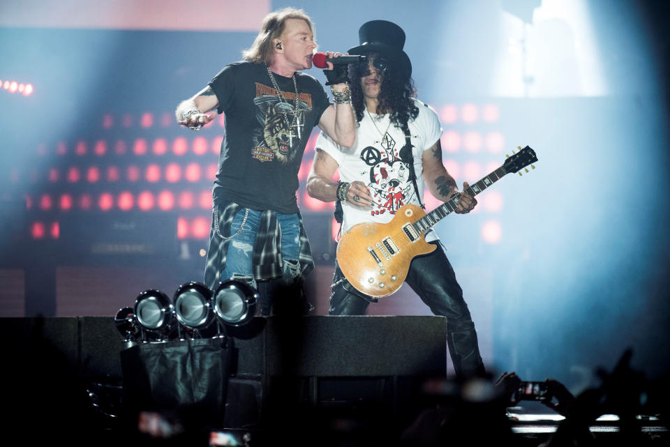 Axl Rose, lead singer of American rock band Guns N' Roses, performs with Slash at Parken Stadium in Copenhagen, Denmark June 27, 2017. Picture taken June 27, 2017. Scanpix Denmark/Mads Joakim Rimer Rasmussen via REUTERS ATTENTION EDITORS - THIS IMAGE WAS PROVIDED BY A THIRD PARTY. NOT FOR SALE FOR MARKETING OR ADVERTISING CAMPAIGNS. DENMARK OUT. NO COMMERCIAL OR EDITORIAL SALES IN DENMARK.