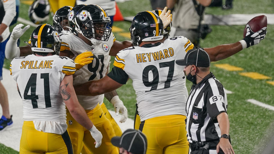 Pittsburgh Steelers defensive tackle Cameron Heyward (97) celebrates with teammates after a turnover by the New York Giants during the third quarter of an NFL football game Monday, Sept. 14, 2020, in East Rutherford, N.J. (AP Photo/Seth Wenig)