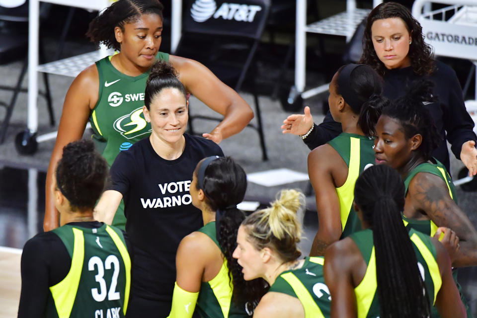 Sue Bird was among the players who led many in the league to wear "Vote Warnock" shirts in support of a US Senate race in Georgia. (Photo by Julio Aguilar/Getty Images)