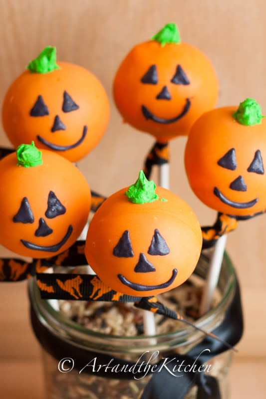 <p>Art and the Kitchen</p><p>Delicious Halloween cake pops decorated like a jack-o'-lanterns make a great treat for your Halloween party. Yummy homemade treats for those special trick-or-treaters.</p><p><strong>Get the recipe: <a href="https://www.artandthekitchen.com/halloween-cake-pops/" rel="nofollow noopener" target="_blank" data-ylk="slk:Halloween Cake Pops;elm:context_link;itc:0;sec:content-canvas" class="link ">Halloween Cake Pops</a></strong></p>