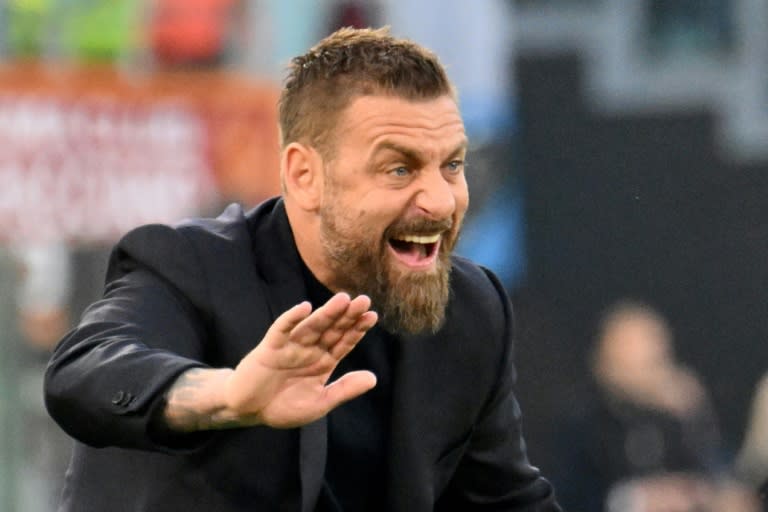 Daniele De Rossi's impressive spell as interim coach with <a class="link " href="https://sports.yahoo.com/soccer/teams/roma/" data-i13n="sec:content-canvas;subsec:anchor_text;elm:context_link" data-ylk="slk:AS Roma;sec:content-canvas;subsec:anchor_text;elm:context_link;itc:0">AS Roma</a> has seen him rewarded by the club's owners (Alberto PIZZOLI)