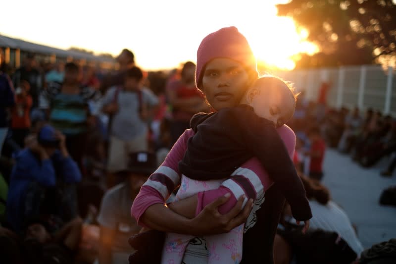 Large migrant caravan prepares to enter Mexico from Guatemala