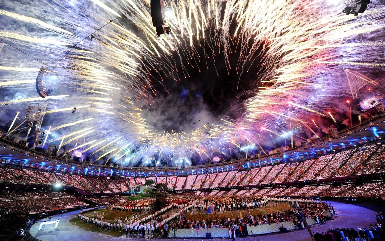 General view as fireworks illuminate the sky during the Opening Ceremony of the London 2012 Olympic Games at the Olympic Stadium on July 27, 2012 in London, England