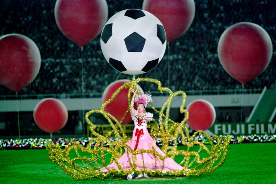 A performer dances during the opening ceremony of what would be the first FIFA Women’s World Cup, in Guangzhou, <a class="link " href="https://sports.yahoo.com/soccer/teams/china-women/" data-i13n="sec:content-canvas;subsec:anchor_text;elm:context_link" data-ylk="slk:China;sec:content-canvas;subsec:anchor_text;elm:context_link;itc:0">China</a>, Nov. 16, 1991.<span class="copyright">Tommy Cheng—AFP/Getty Images</span>