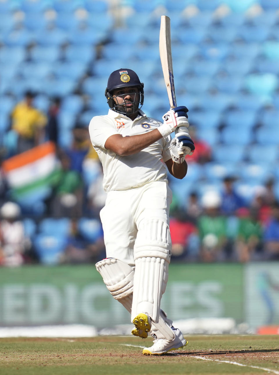 India's cricket captain Rohit Sharma plays a shot during the second day of the first cricket test match between India and Australia, in Nagpur, India, Friday, Feb. 10, 2023. (AP Photo/ Rafiq Maqbool)